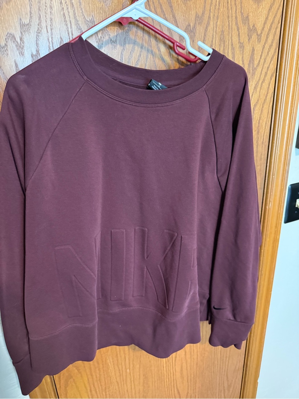 Nike Women's Burgundy Embossed Logo Crewneck Sweatshirt